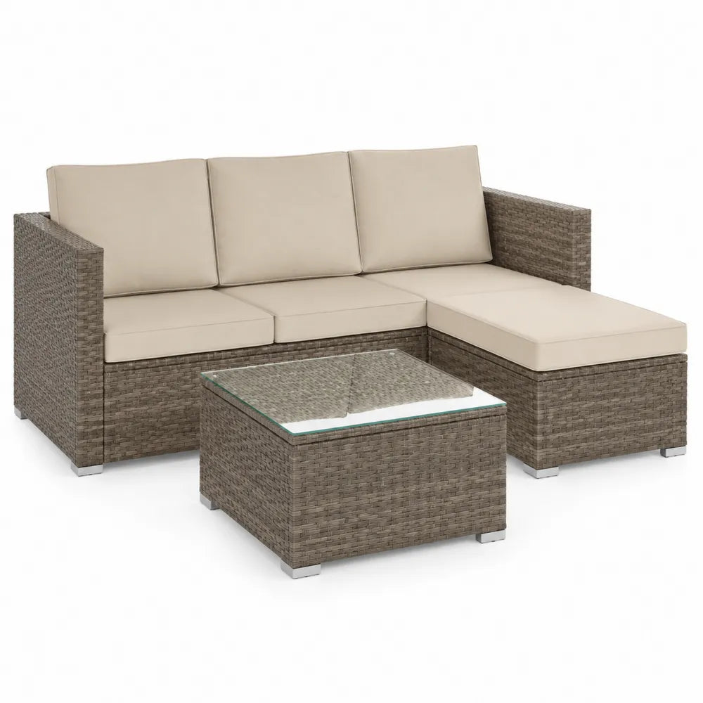 Conjunto de sofá de ratán sintético con cojines beige y mesa de vidrio